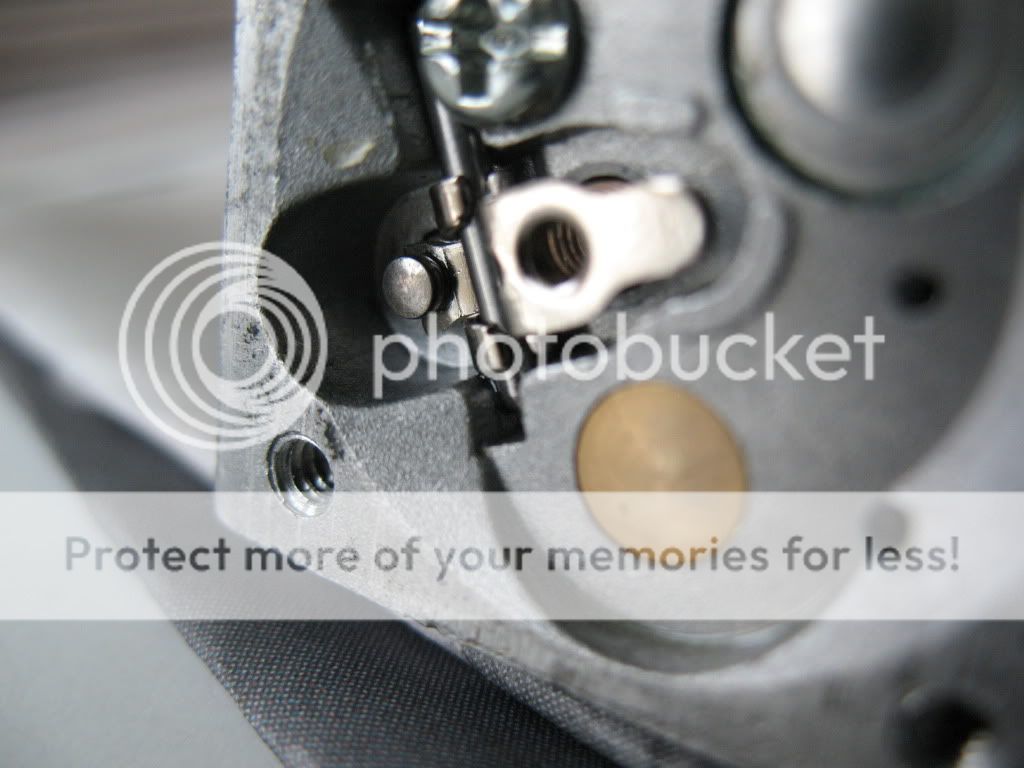 026 spitting gas out of carb